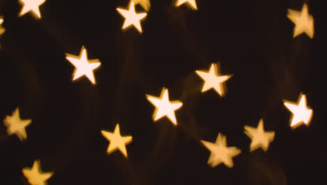 Background-Of-Christmas-Lights-In-The-Shape-Of-Stars-1